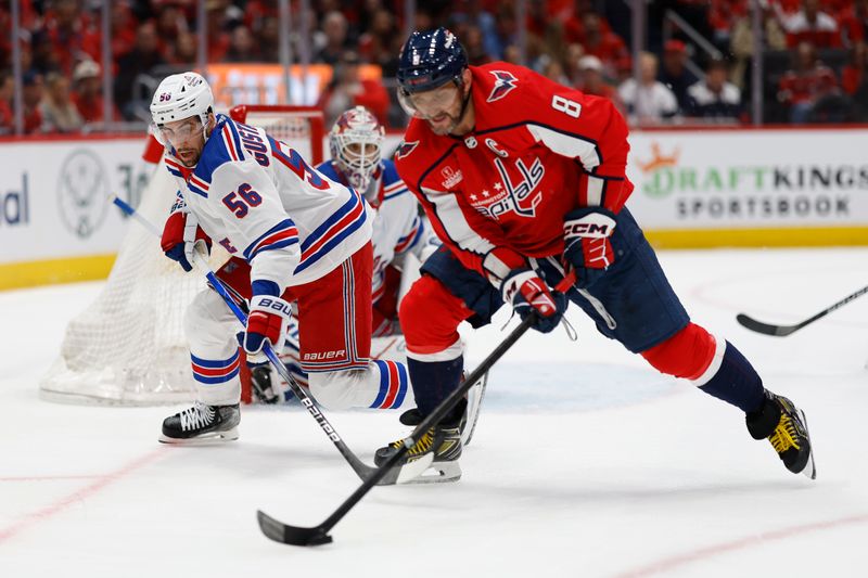 Apr 26, 2024; Washington, District of Columbia, USA; New York Rangers defenseman Erik Gustafsson (56) battles for the puck with Washington Capitals left wing Alex Ovechkin (8) as Rangers goaltender Igor Shesterkin (31) looks on in the third period in game three of the first round of the 2024 Stanley Cup Playoffs at Capital One Arena. Mandatory Credit: Geoff Burke-USA TODAY Sports