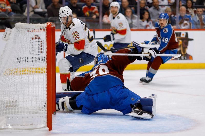 Dec 11, 2025; Denver, Colorado, USA; Florida Panthers center Carter Verhaeghe (23) watches after the puck bounces off the post against Colorado Avalanche goaltender Mackenzie Blackwood (39) in the first period at Ball Arena. Mandatory Credit: Isaiah J. Downing-Imagn Images