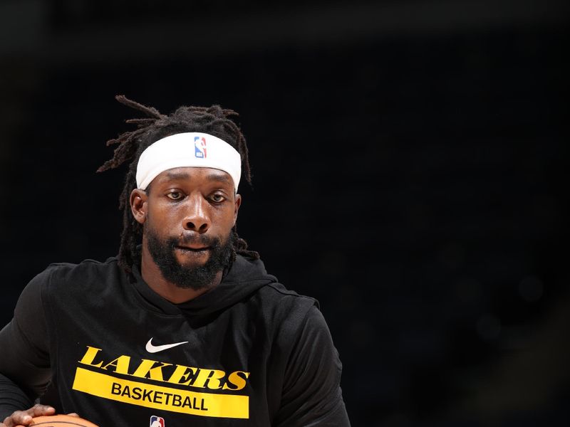 MINNEAPOLIS, MN -  OCTOBER 28: Patrick Beverly #21 of the Los Angeles Lakers warms up before the game against the Minnesota Timberwolves on October 28, 2022 at Target Center in Minneapolis, Minnesota. NOTE TO USER: User expressly acknowledges and agrees that, by downloading and or using this Photograph, user is consenting to the terms and conditions of the Getty Images License Agreement. Mandatory Copyright Notice: Copyright 2022 NBAE (Photo by David Sherman/NBAE via Getty Images)