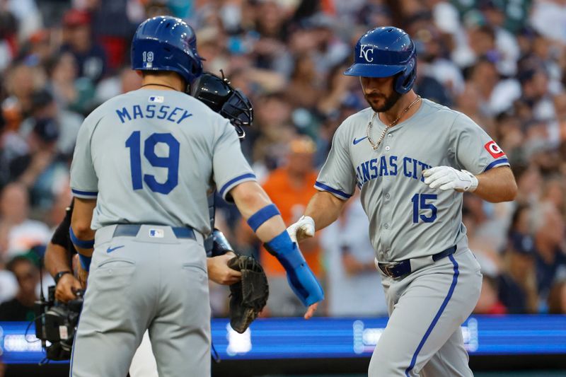 Aug 3, 2024; Detroit, Michigan, USA;  Kansas City Royals shortstop Paul DeJong (15) receives congratulations from second baseman Michael Massey (19) after he hits a two run home run in the seventh inning against the Detroit Tigers at  Comerica Park. Mandatory Credit: Rick Osentoski-USA TODAY Sports