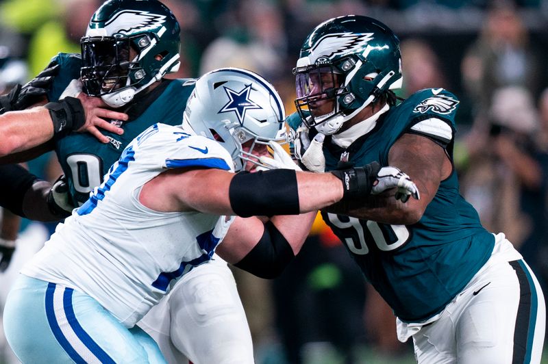 Philadelphia Eagles defensive tackle Jalen Carter (98) in action against Dallas Cowboys guard Zack Martin (70) during the NFL football game, Sunday, Nov. 5, 2023, in Philadelphia. (AP Photo/Chris Szagola)