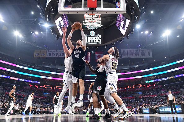 LOS ANGELES, CA - DECEMBER 6: Ivica Zubac #40 of the LA Clippers grabs the rebound during the game  on December 6, 2023 at Crypto.Com Arena in Los Angeles, California. NOTE TO USER: User expressly acknowledges and agrees that, by downloading and/or using this Photograph, user is consenting to the terms and conditions of the Getty Images License Agreement. Mandatory Copyright Notice: Copyright 2023 NBAE (Photo by Adam Pantozzi/NBAE via Getty Images)