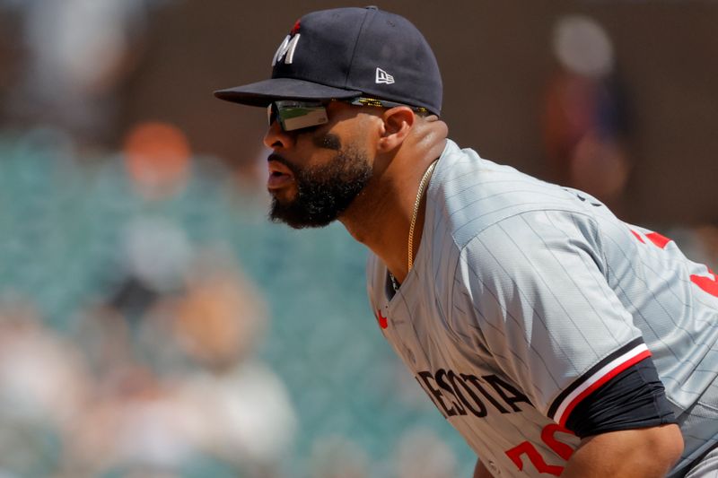 Jul 28, 2024; Detroit, Michigan, USA;  Minnesota Twins first baseman Carlos Santana (30) in the field in the seventh inning against the Detroit Tigers at Comerica Park. Mandatory Credit: Rick Osentoski-USA TODAY Sports