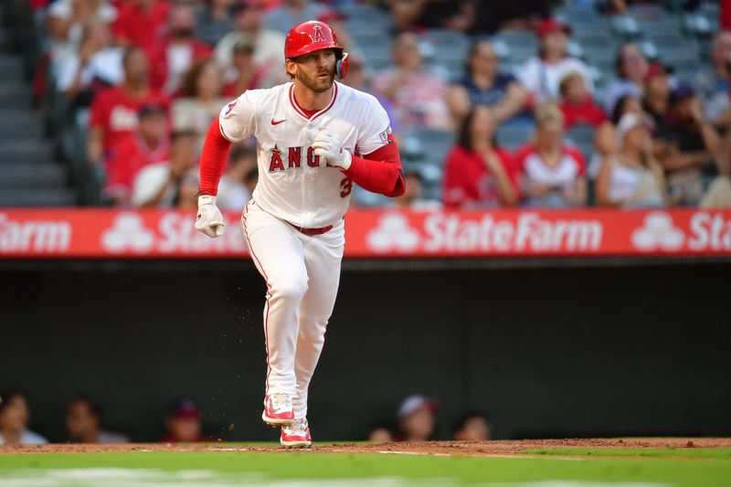 Aug 30, 2024; Anaheim, California, USA; Los Angeles Angels left fielder Taylor Ward (3) runs after hitting a solo home run against the Seattle Mariners during the first inning at Angel Stadium. Mandatory Credit: Gary A. Vasquez-USA TODAY Sports