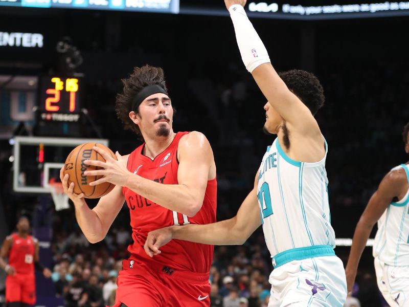 CHARLOTTE, NC - NOVEMBER 27:  Jaime Jaquez Jr. #11 of the Miami Heat handles the ball during the game against the Charlotte Hornets on November 27, 2024 at Spectrum Center in Charlotte, North Carolina. NOTE TO USER: User expressly acknowledges and agrees that, by downloading and or using this photograph, User is consenting to the terms and conditions of the Getty Images License Agreement. Mandatory Copyright Notice: Copyright 2024 NBAE (Photo by Brock Williams-Smith/NBAE via Getty Images)