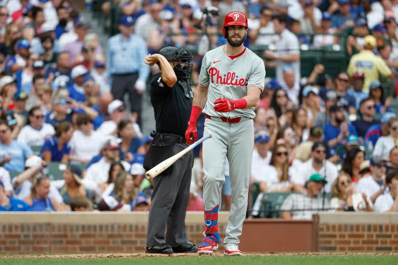 Jul 4, 2024; Chicago, Illinois, USA; Philadelphia Phillies outfielder David Dahl (31) reacts after striking out against the Chicago Cubs during the seventh inning at Wrigley Field. Mandatory Credit: Kamil Krzaczynski-USA TODAY Sports