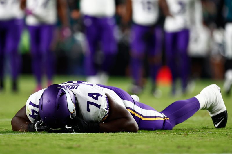 Minnesota Vikings offensive tackle Olisaemeka Udoh (74) lies injured on the turf during an NFL football game against the Philadelphia Eagles, Thursday, Sep. 14, 2023, in Philadelphia. (AP Photo/Rich Schultz)