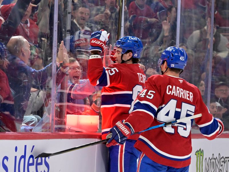 Jan 7, 2026; Montreal, Quebec, CAN; Montreal Canadiens forward Alexandre Texier (85) celebrates after scoring a goal against the Calgary Flames during the second period at the Bell Centre. Mandatory Credit: Eric Bolte-Imagn Images