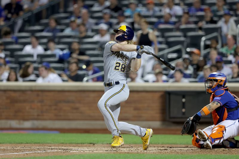 Jun 26, 2023; New York City, New York, USA; Milwaukee Brewers center fielder Joey Wiemer (28) follows through on a two run home run against the New York Mets during the sixth inning at Citi Field. Mandatory Credit: Brad Penner-USA TODAY Sports