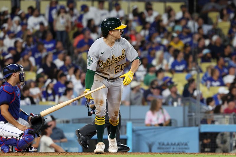 Aug 3, 2023; Los Angeles, California, USA;  Oakland Athletics second baseman Zack Gelof (20) hits a home run during the sixth inning against the Los Angeles Dodgers at Dodger Stadium. Mandatory Credit: Kiyoshi Mio-USA TODAY Sports