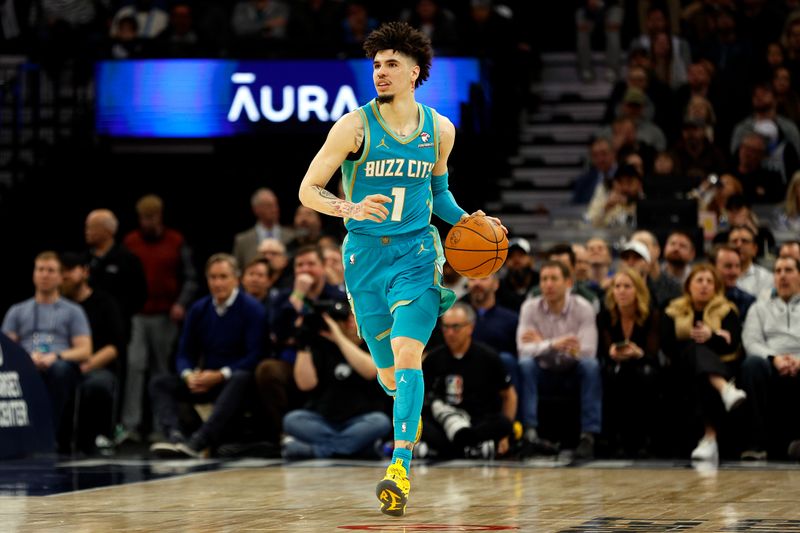 MINNEAPOLIS, MINNESOTA - JANUARY 22: LaMelo Ball #1 of the Charlotte Hornets dribbles the ball against the Minnesota Timberwolves in the fourth quarter at Target Center on January 22, 2024 in Minneapolis, Minnesota. The Hornets won 128-125. NOTE TO USER: User expressly acknowledges and agrees that, by downloading and or using this photograph, User is consenting to the terms and conditions of the Getty Images License Agreement. (Photo by David Berding/Getty Images)