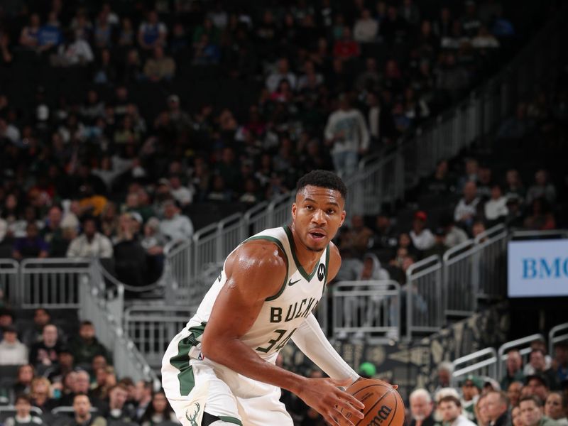 MILWAUKEE, WI - OCTOBER 20: Giannis Antetokounmpo #34 of the Milwaukee Bucks handles the ball during the preseason game on October 20, 2023 at the Fiserv Forum Center in Milwaukee, Wisconsin. NOTE TO USER: User expressly acknowledges and agrees that, by downloading and or using this Photograph, user is consenting to the terms and conditions of the Getty Images License Agreement. Mandatory Copyright Notice: Copyright 2023 NBAE (Photo by Gary Dineen/NBAE via Getty Images).