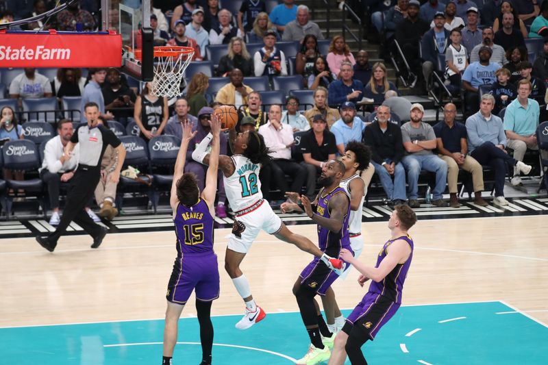 MEMPHIS, TN - NOVEMBER 6: Ja Morant #12 of the Memphis Grizzlies drives to the basket during the game against the Los Angeles Lakers on November 6, 2024 at FedExForum in Memphis, Tennessee. NOTE TO USER: User expressly acknowledges and agrees that, by downloading and or using this photograph, User is consenting to the terms and conditions of the Getty Images License Agreement. Mandatory Copyright Notice: Copyright 2024 NBAE (Photo by Joe Murphy/NBAE via Getty Images)