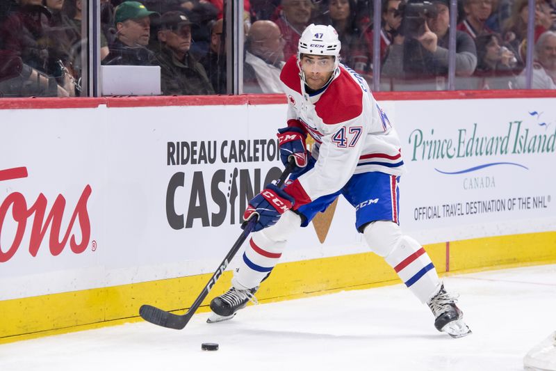 Apr 13, 2024; Ottawa, Ontario, CAN; Montreal Canadiens defenseman Jayden Struble (47) skates with the puck in the first period against the Ottawa Senators at the Canadian Tire Centre. Mandatory Credit: Marc DesRosiers-USA TODAY Sports