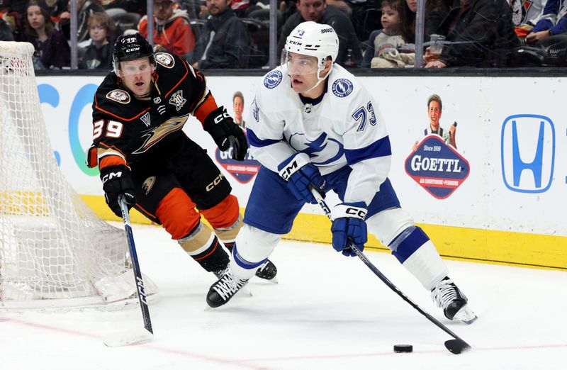 Mar 24, 2024; Anaheim, California, USA; Tampa Bay Lightning left wing Conor Sheary (73) passes from Anaheim Ducks center Ben Meyers (39) during the first period at Honda Center. Mandatory Credit: Jason Parkhurst-USA TODAY Sports