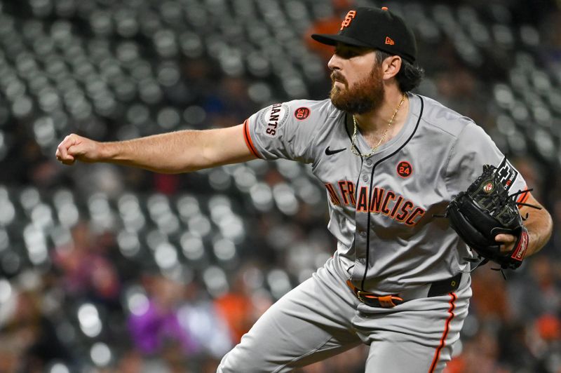 Sep 18, 2024; Baltimore, Maryland, USA;  San Francisco Giants pitcher Ryan Walker (74) throws a ninth inning pitch against the Baltimore Orioles at Oriole Park at Camden Yards. Mandatory Credit: Tommy Gilligan-Imagn Images