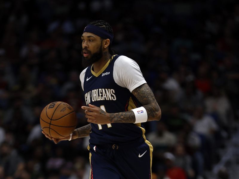 NEW ORLEANS, LOUISIANA - MARCH 13: Brandon Ingram #14 of the New Orleans Pelicans drives the ball up the court against the Cleveland Cavaliers at Smoothie King Center on March 13, 2024 in New Orleans, Louisiana.   NOTE TO USER: User expressly acknowledges and agrees that, by downloading and or using this photograph, User is consenting to the terms and conditions of the Getty Images License Agreement.  (Photo by Chris Graythen/Getty Images)