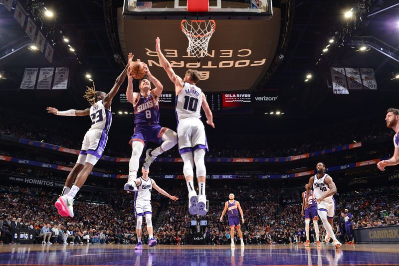 PHOENIX, AZ - FEBRUARY 13:  Grayson Allen #8 of the Phoenix Suns drives to the basket during the game against the Sacramento Kings on February 13, 2024 at Footprint Center in Phoenix, Arizona. NOTE TO USER: User expressly acknowledges and agrees that, by downloading and or using this photograph, user is consenting to the terms and conditions of the Getty Images License Agreement. Mandatory Copyright Notice: Copyright 2024 NBAE (Photo by Barry Gossage/NBAE via Getty Images)