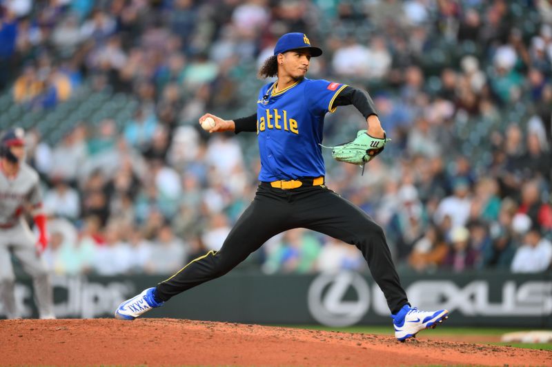 May 29, 2025; Seattle, Washington, USA; Seattle Mariners relief pitcher Carlos Vargas (54) pitches to the Washington Nationals during the seventh inning at T-Mobile Park. Mandatory Credit: Steven Bisig-Imagn Images
