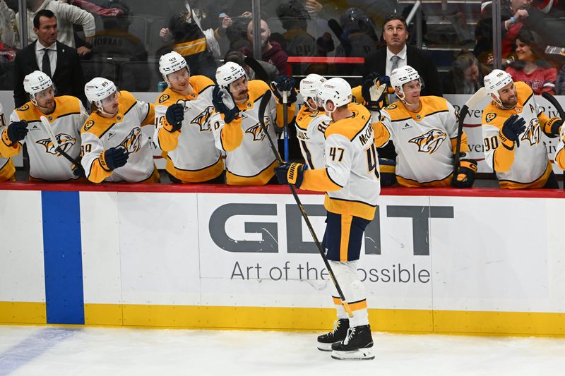 Feb 5, 2026; Washington, District of Columbia, USA; Nashville Predators right wing Michael McCarron (47) is congratulated by teammates after scoring a goal against the Washington Capitals during the third period at Capital One Arena. Mandatory Credit: Brad Mills-Imagn Images