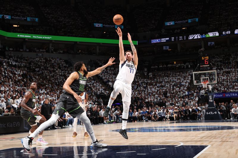 MINNEAPOLIS, MN - MAY 30: Luka Doncic #77 of the Dallas Mavericks shoots the ball during the game against the Minnesota Timberwolves during Round 3 Game 5 of the 2024 NBA Playoffs on May 30, 2024 at Target Center in Minneapolis, Minnesota. NOTE TO USER: User expressly acknowledges and agrees that, by downloading and or using this Photograph, user is consenting to the terms and conditions of the Getty Images License Agreement. Mandatory Copyright Notice: Copyright 2024 NBAE (Photo by Joe Murphy/NBAE via Getty Images)