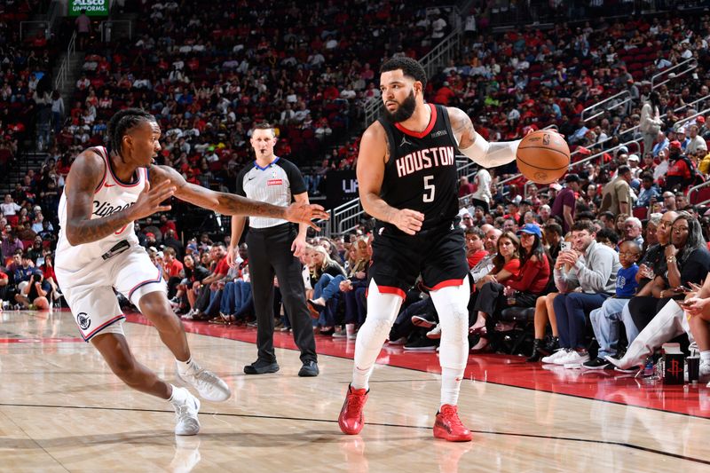 HOUSTON, TX - NOVEMBER 13:  Fred VanVleet #5 of the Houston Rockets dribbles the ball during the game against the LA Clippers on November 13, 2024 at the Toyota Center in Houston, Texas. NOTE TO USER: User expressly acknowledges and agrees that, by downloading and or using this photograph, User is consenting to the terms and conditions of the Getty Images License Agreement. Mandatory Copyright Notice: Copyright 2024 NBAE (Photo by Logan Riely/NBAE via Getty Images)