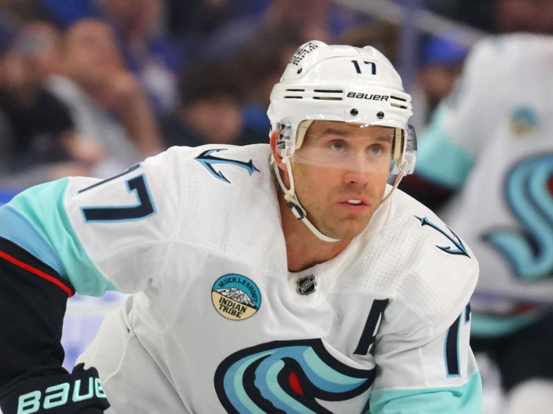 Jan 9, 2024; Buffalo, New York, USA;  Seattle Kraken center Jaden Schwartz (17) looks for the puck during the first period against the Buffalo Sabres at KeyBank Center. Mandatory Credit: Timothy T. Ludwig-USA TODAY Sports