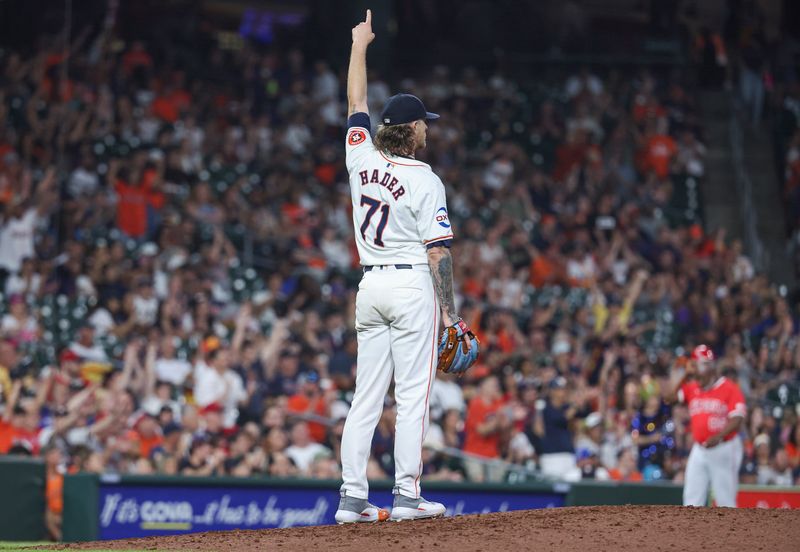 May 21, 2024; Houston, Texas, USA; Houston Astros relief pitcher Josh Hader (71) points up after a defensive play during the ninth inning against the Los Angeles Angels at Minute Maid Park. Mandatory Credit: Troy Taormina-USA TODAY Sports