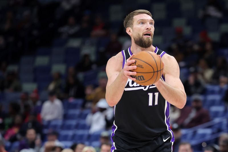 NEW ORLEANS, LOUISIANA - DECEMBER 12: Domantas Sabonis #11 of the Sacramento Kings shoots against the New Orleans Pelicans during a game at the Smoothie King Center on December 12, 2024 in New Orleans, Louisiana. NOTE TO USER: User expressly acknowledges and agrees that, by downloading and or using this Photograph, user is consenting to the terms and conditions of the Getty Images License Agreement. (Photo by Jonathan Bachman/Getty Images)