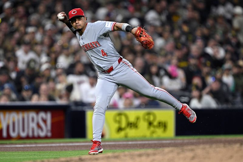 Apr 29, 2024; San Diego, California, USA; Cincinnati Reds third baseman Santiago Espinal (4) throws to first base on a ground out by San Diego Padres third baseman Manny Machado (not pictured) during the seventh inning at Petco Park. Mandatory Credit: Orlando Ramirez-USA TODAY Sports