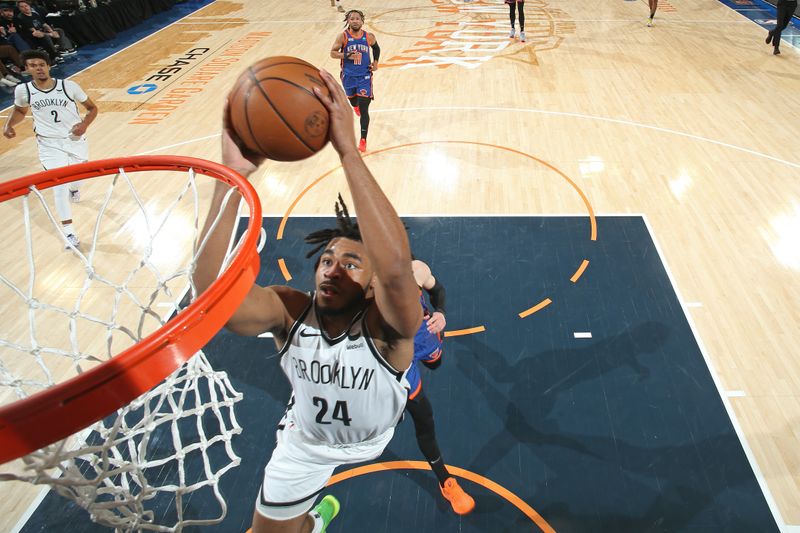 NEW YORK, NY - MARCH 23: Cam Thomas #24 of the Brooklyn Nets dunks the ball during the game against the New York Knicks on March 23, 2024 at Madison Square Garden in New York City, New York.  NOTE TO USER: User expressly acknowledges and agrees that, by downloading and or using this photograph, User is consenting to the terms and conditions of the Getty Images License Agreement. Mandatory Copyright Notice: Copyright 2024 NBAE  (Photo by Nathaniel S. Butler/NBAE via Getty Images)