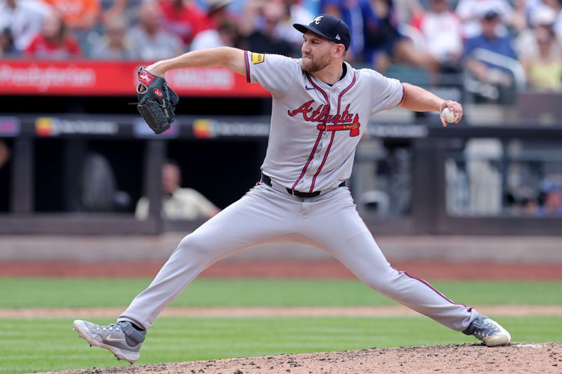 Jul 28, 2024; New York City, New York, USA; Atlanta Braves relief pitcher Dylan Lee (52) pitches against the New York Mets during the fifth inning at Citi Field. Mandatory Credit: Brad Penner-USA TODAY Sports