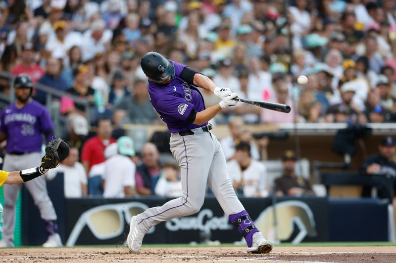 Aug 2, 2024; San Diego, California, USA;  Colorado Rockies right fielder Kris Bryant (23) hits a single during the second inning against the San Diego Padres at Petco Park. Mandatory Credit: David Frerker-USA TODAY Sports