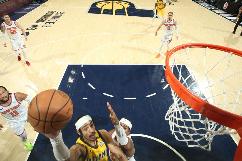 INDIANAPOLIS, IN - MAY 17: Andrew Nembhard #2 of the Indiana Pacers drives to the basket during the game against the New York Knicks during Round 2 Game 6 of the 2024 NBA Playoffs on May 17, 2024 at Gainbridge Fieldhouse in Indianapolis, Indiana. NOTE TO USER: User expressly acknowledges and agrees that, by downloading and or using this Photograph, user is consenting to the terms and conditions of the Getty Images License Agreement. Mandatory Copyright Notice: Copyright 2024 NBAE (Photo by Nathaniel S. Butler/NBAE via Getty Images)