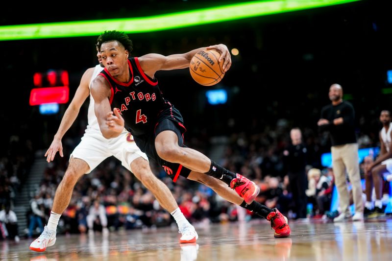 TORONTO, ON - FEBRUARY 10: Scottie Barnes #4 and Scottie Barnes #4 of the Toronto Raptors drives against the Cleveland Cavaliers during the second half of their basketball game at the Scotiabank Arena on February 10, 2024 in Toronto, Ontario, Canada. NOTE TO USER: User expressly acknowledges and agrees that, by downloading and/or using this Photograph, user is consenting to the terms and conditions of the Getty Images License Agreement. (Photo by Mark Blinch/Getty Images)