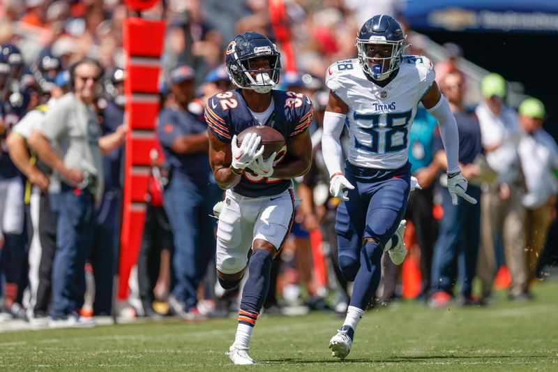 Chicago Bears wide receiver Isaiah Ford (32) catches a pass against Tennessee Titans cornerback Alonzo Davis (38) during the second half of an NFL preseason football game, Saturday, Aug. 12, 2023, in Chicago. (AP Photo/Kamil Krzaczynski)