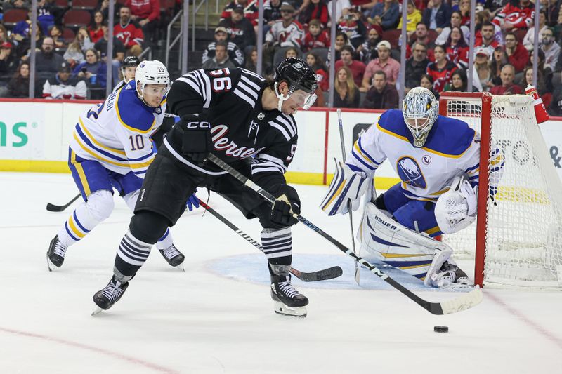 Oct 27, 2023; Newark, New Jersey, USA; New Jersey Devils left wing Erik Haula (56) plays the puck in front of Buffalo Sabres goaltender Ukko-Pekka Luukkonen (1) and defenseman Henri Jokiharju (10) during the third period at Prudential Center. Mandatory Credit: Vincent Carchietta-USA TODAY Sports