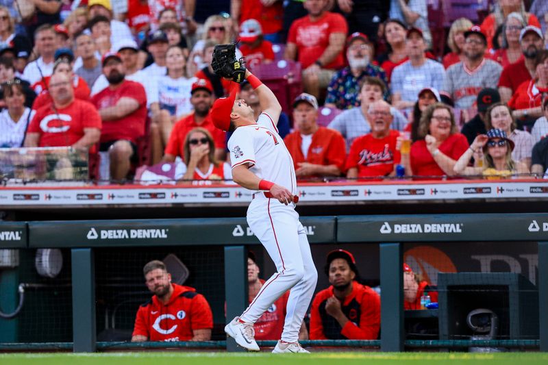 Jun 2, 2025; Cincinnati, Ohio, USA; Cincinnati Reds first baseman Spencer Steer (7) catches a pop up hit by Milwaukee Brewers catcher William Contreras (not pictured) in the first inning at Great American Ball Park. Mandatory Credit: Katie Stratman-Imagn Images