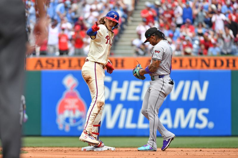 Jun 23, 2024; Philadelphia, Pennsylvania, USA; Philadelphia Phillies third base Alec Bohm (28) stand on second base after hitting a double against the Arizona Diamondbacks during the second inning at Citizens Bank Park. Mandatory Credit: Eric Hartline-USA TODAY Sports