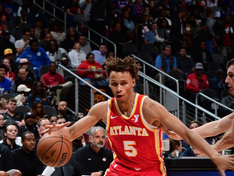 ATLANTA, GA - NOVEMBER 6:  Dyson Daniels #5 of the Atlanta Hawks dribbles the ball during the game against the New York Knicks during a regular season game on November 6, 2024 at State Farm Arena in Atlanta, Georgia.  NOTE TO USER: User expressly acknowledges and agrees that, by downloading and/or using this Photograph, user is consenting to the terms and conditions of the Getty Images License Agreement. Mandatory Copyright Notice: Copyright 2024 NBAE (Photo by Scott Cunningham/NBAE via Getty Images)