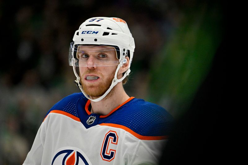 Apr 3, 2024; Dallas, Texas, USA; Edmonton Oilers center Connor McDavid (97) looks on before the face-off against the Dallas Stars during the third period at the American Airlines Center. Mandatory Credit: Jerome Miron-USA TODAY Sports