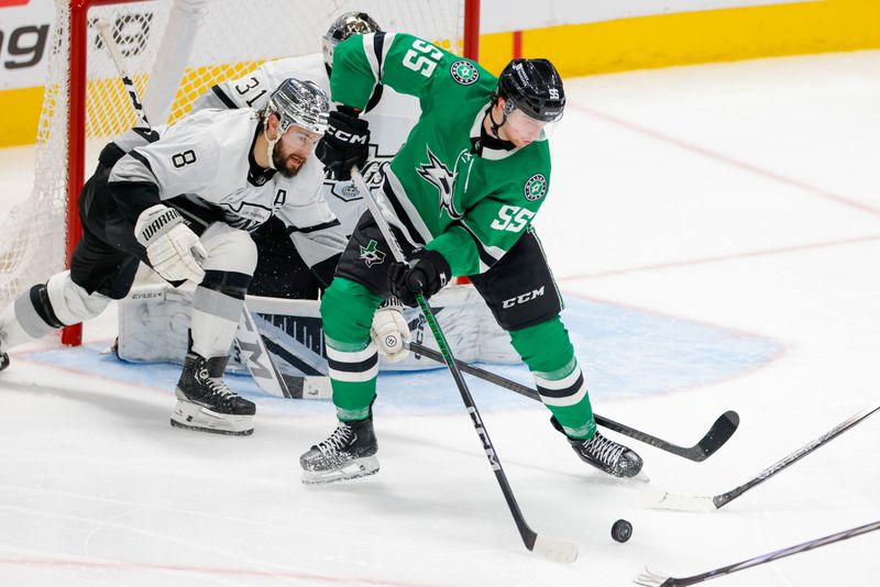 Mar 16, 2024; Dallas, Texas, USA; Dallas Stars defenseman Thomas Harley (55) works a puck in front of the Los Angeles Kings net during the third period at American Airlines Center. Mandatory Credit: Andrew Dieb-USA TODAY Sports