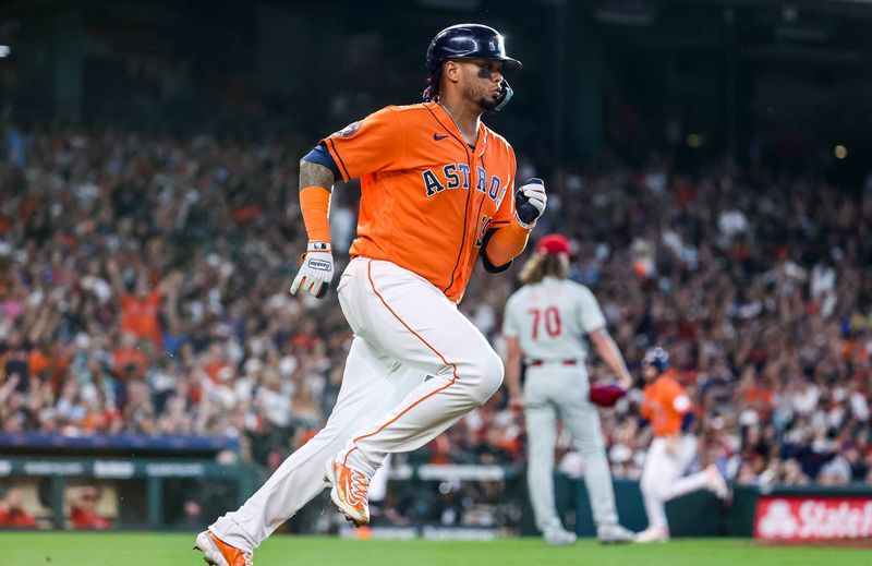 Apr 30, 2023; Houston, Texas, USA; Philadelphia Phillies starting pitcher Bailey Falter (70) reacts as Houston Astros catcher Martin Maldonado (15) hits an RBI double during the second inning at Minute Maid Park. Mandatory Credit: Troy Taormina-USA TODAY Sports