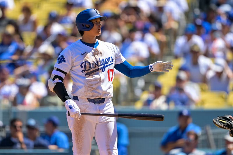 Aug 31, 2025; Los Angeles, California, USA; Los Angeles Dodgers designated hitter Shohei Ohtani (17) calls for time during his second at bat during the second inning at Dodger Stadium. Mandatory Credit: Jayne Kamin-Oncea-Imagn Images