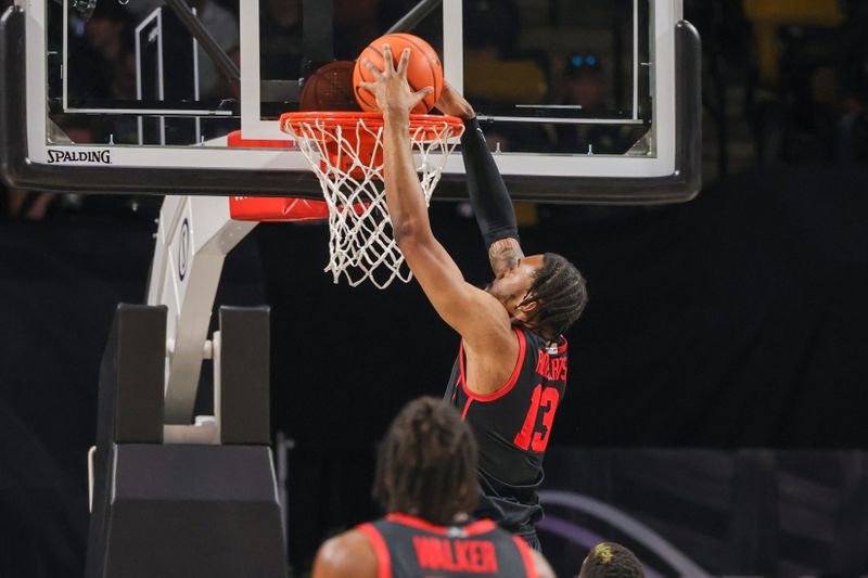 Jan 25, 2023; Orlando, Florida, USA; Houston Cougars forward J'Wan Roberts (13) dunks the ball during the first half against the UCF Knights at Addition Financial Arena. Mandatory Credit: Mike Watters-USA TODAY Sports