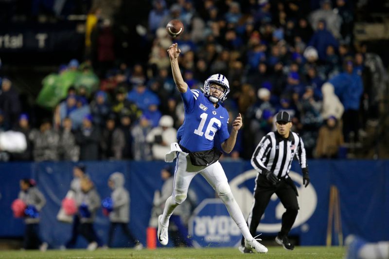 Oct 19, 2019; Provo, UT, USA; Brigham Young Cougars quarterback Baylor Romney (16) hrows a pass against the Boise State Broncos at LaVell Edwards Stadium. Mandatory Credit: Gabe Mayberry-USA TODAY Sports