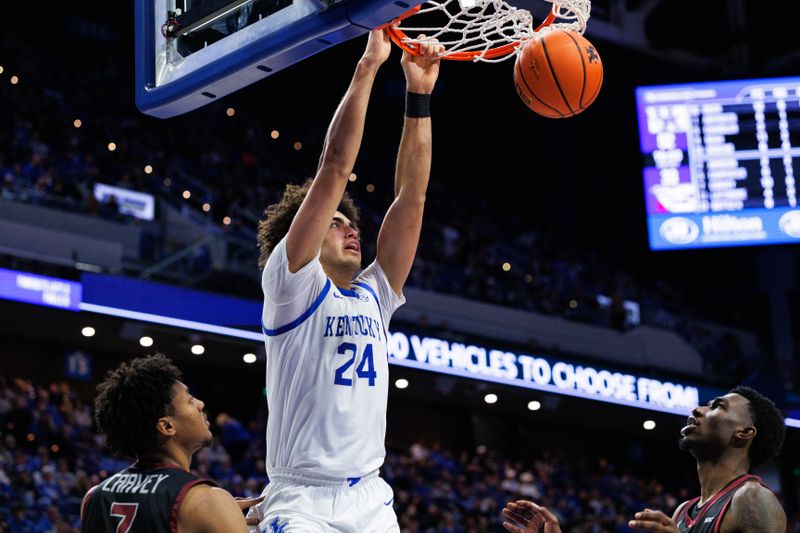 Dec 9, 2025; Lexington, Kentucky, USA; Kentucky Wildcats center Malachi Moreno (24) dunks the ball during the second half against the North Carolina Central Eagles at Rupp Arena at Central Bank Center. Mandatory Credit: Jordan Prather-Imagn Images