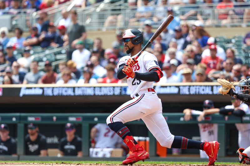 May 24, 2023; Minneapolis, Minnesota, USA; Minnesota Twins designated hitter Byron Buxton (25) hits a single against the San Francisco Giants during the first inning against the San Francisco Giants at Target Field. Mandatory Credit: Matt Krohn-USA TODAY Sports