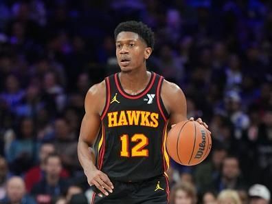 PHILADELPHIA, PA - DECEMBER 8: De'Andre Hunter #12 of the Atlanta Hawks dribbles the ball during the game against the Philadelphia 76ers on December 8, 2023 at the Wells Fargo Center in Philadelphia, Pennsylvania NOTE TO USER: User expressly acknowledges and agrees that, by downloading and/or using this Photograph, user is consenting to the terms and conditions of the Getty Images License Agreement. Mandatory Copyright Notice: Copyright 2023 NBAE (Photo by Jesse D. Garrabrant/NBAE via Getty Images)