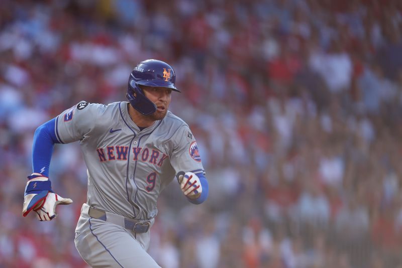 Oct 6, 2024; Philadelphia, Pennsylvania, USA; New York Mets outfielder Brandon Nimmo (9) runs to first base after hitting a single in the third inning against the Philadelphia Phillies during game two of the NLDS for the 2024 MLB Playoffs at Citizens Bank Park. Mandatory Credit: Bill Streicher-Imagn Images